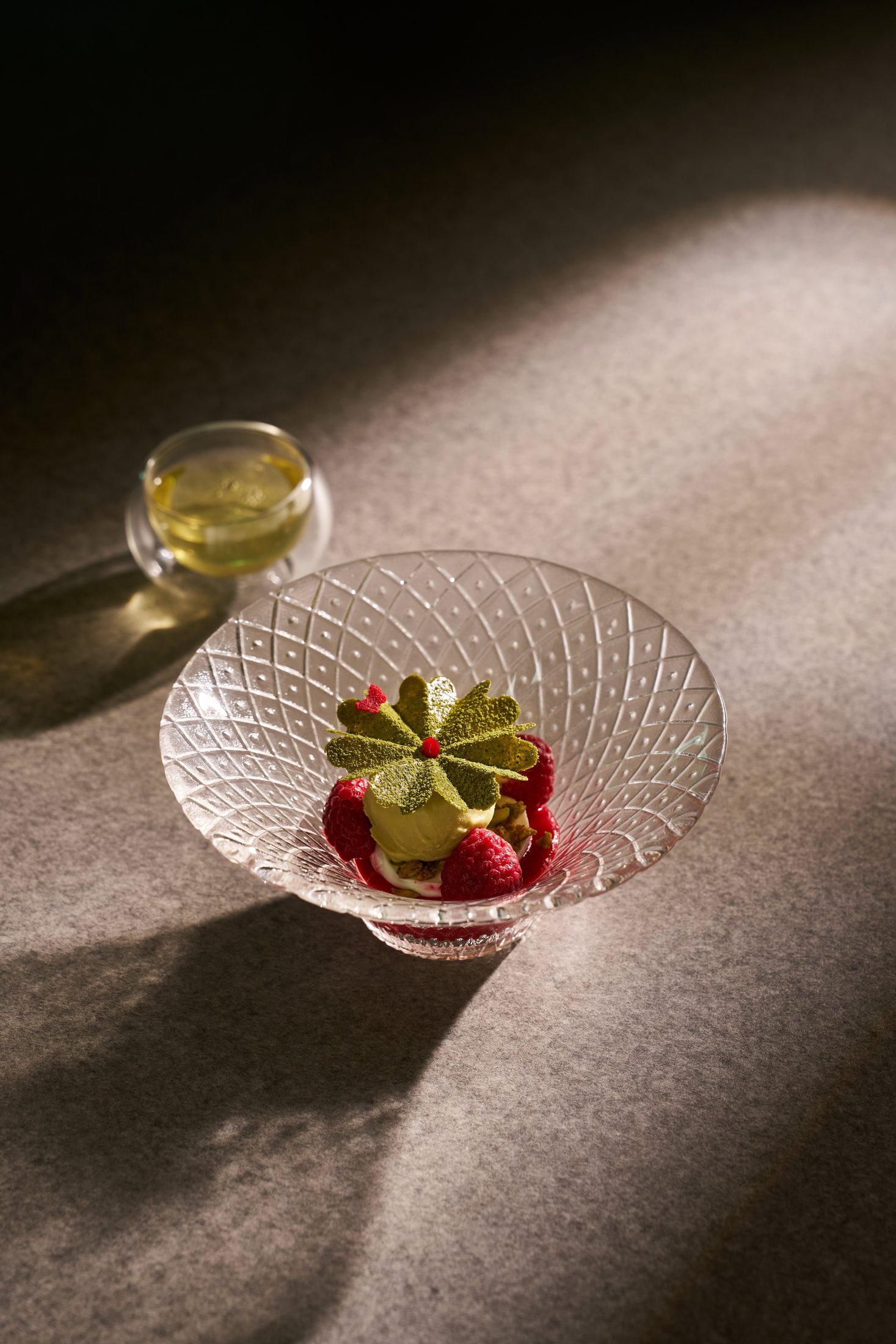 Pistachio genmaicha — pistachio gelato with raspberry and uji matcha biscuit